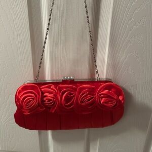 Brand new Red Rose pattern clutch
